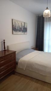 Posteľ alebo postele v izbe v ubytovaní Apart Mihai Viteazu Residence