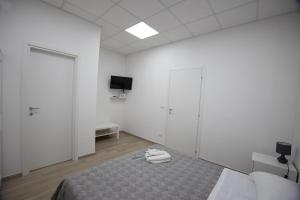 Postel nebo postele na pokoji v ubytování Giusvinci
