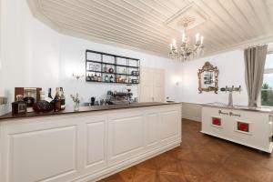 Nápoje v ubytovaní Hotel & Restaurant Chateau Trnová