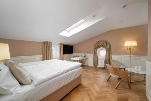 Posteľ alebo postele v izbe v ubytovaní Hotel & Restaurant Chateau Trnová