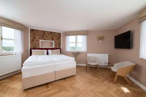 Posteľ alebo postele v izbe v ubytovaní Hotel & Restaurant Chateau Trnová