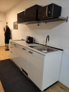 A kitchen or kitchenette at Apartment Hagen