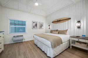 Casey Key Resorts - Beachfront客房内的一张或多张床位