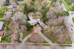 an aerial view of an estate with a house at Beautiful in town acreage in Lincoln