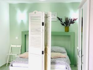Postel nebo postele na pokoji v ubytování Villa DA