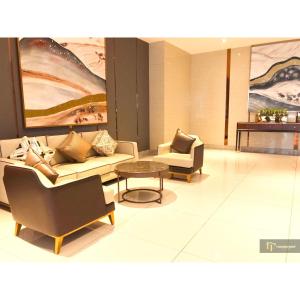 Posezení v ubytování R&F PRINCESS COVE BY HOMEFORT SUITES
