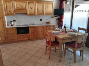 Kuchyňa alebo kuchynka v ubytovaní Chalet Alberti