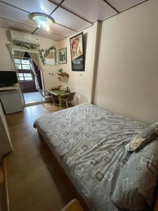 Postel nebo postele na pokoji v ubytování Wangyuku B&B