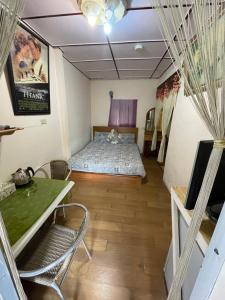 Postel nebo postele na pokoji v ubytování Wangyuku B&B