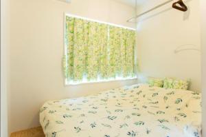 Ένα ή περισσότερα κρεβάτια σε δωμάτιο στο KitaSenju6mwalk#UenoAsakusaSkytree#Max11#Have extra fee