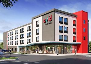 a rendering of a building with a xo hotel at avid hotels - Memphis - Southaven, an IHG Hotel in Southaven