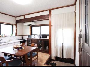 Kuchyň nebo kuchyňský kout v ubytování Guest House Zen
