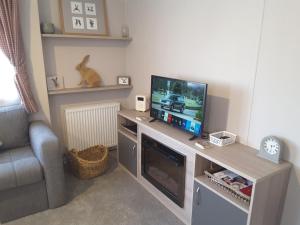 TV a/nebo společenská místnost v ubytování No 46 Coorie-in