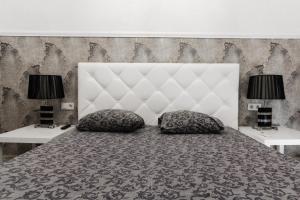 Posteľ alebo postele v izbe v ubytovaní Katerynynska Street 3-bedrooms Apartment