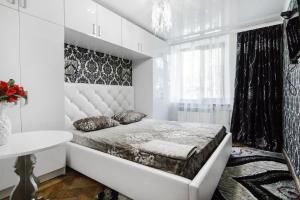 Posteľ alebo postele v izbe v ubytovaní Katerynynska Street 3-bedrooms Apartment