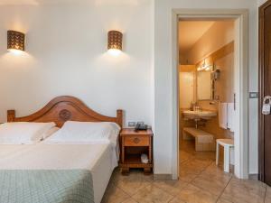 Postelja oz. postelje v sobi nastanitve Hotel RaffaEl