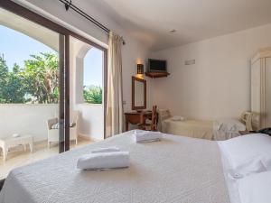 Postelja oz. postelje v sobi nastanitve Hotel RaffaEl