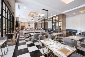 Restaurace v ubytování Bigland Bogor Hotel Powered by Archipelago