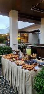 a table with food on top of it at A Villas Resort & Restaurant in Zamboanguita