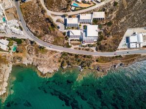an aerial view of a road next to the ocean at Hippocampus Hotel in Naousa