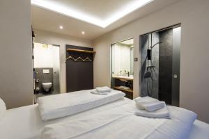 Giường trong phòng chung tại Bergwirt Hotel & Gasthof