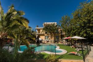 The swimming pool at or close to Apartamentos El Palmeral de Madaria