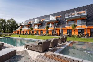 Bazén v ubytování Luxus Resort Rügen Residenz Kubitzer Bodden nebo v jeho okolí