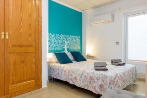 A bed or beds in a room at Casa Bonaire
