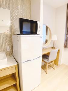 Kuchyň nebo kuchyňský kout v ubytování HOTEL CLA-SS HIROSHIMA-TOKAICHI