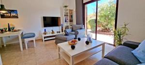 Posezení v ubytování Ferienhaus CASA MAJA Costa Calma Meerblick Garten