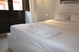 Łóżko lub łóżka w pokoju w obiekcie Del Parque Flats Alvarez Suite