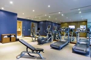 a gym with treadmills and cardio equipment in a room at Global Hotel Panama in Panama City +23 photos