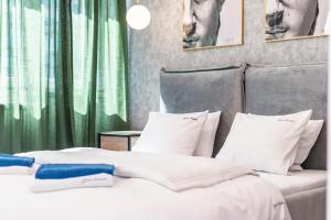 Posteľ alebo postele v izbe v ubytovaní Apartament Moniuszki by Your Freedom