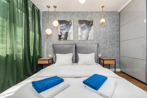 Posteľ alebo postele v izbe v ubytovaní Apartament Moniuszki by Your Freedom