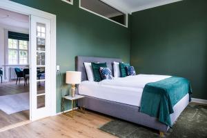 Voodi või voodid majutusasutuse Gem Suites Holiday Apartments toas