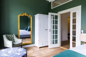 Voodi või voodid majutusasutuse Gem Suites Holiday Apartments toas