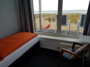 Postel nebo postele na pokoji v ubytování Hotel B&B Seahorse