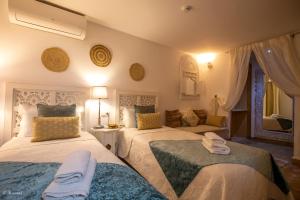
Cama o camas de una habitación en Riad Nila
