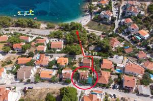 an aerial view of a house with a red circle at Apartment Damir in Postira