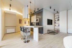 Kuchyňa alebo kuchynka v ubytovaní Sea Symphony Design Apartment