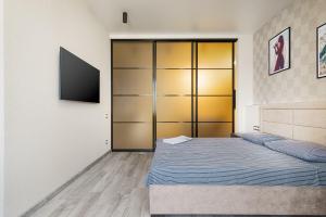 Posteľ alebo postele v izbe v ubytovaní Sea Symphony Design Apartment