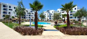 Bazén v ubytování Appartement costa mar martil nebo v jeho okolí