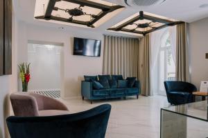 TV a/nebo společenská místnost v ubytování DReAM Boutique Residence