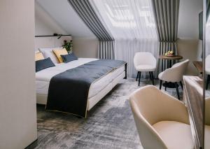 Postel nebo postele na pokoji v ubytování DReAM Boutique Residence + 37 fotografií