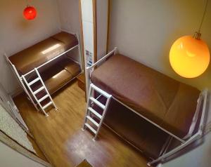 an overhead view of a bedroom with two bunk beds at Hostal Providencia in Santiago