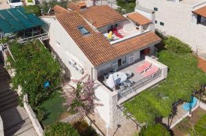 an overhead view of a house with a roof at Apartment Damir in Postira