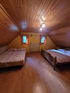 Posteľ alebo postele v izbe v ubytovaní Turistična kmetija Kunstek