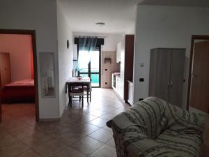 Posteľ alebo postele v izbe v ubytovaní La Rosa dei Venti Apartments Two