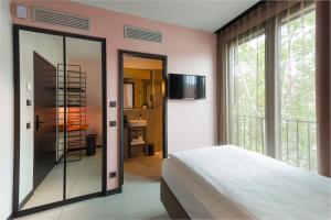 Letto o letti in una camera di EmiLu Design Hotel