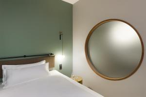 Letto o letti in una camera di EmiLu Design Hotel
